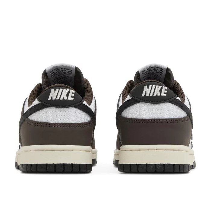 The Dunk Low Next Nature Baroque Brown features rich hues and recycled materials for a stylish, eco-conscious look. Shop on hypeelixir.com
