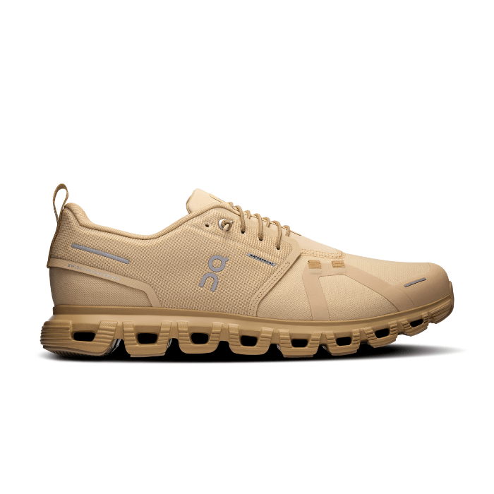 "On Running Cloud 6 Waterproof Sand Dune sneakers by Hype Elixir – lightweight, waterproof, and cushioned footwear for all-weather comfort and durability."