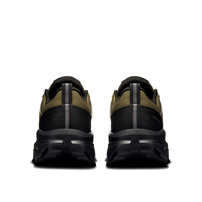 "On Running Cloudrock Low Waterproof Hunter Black hiking shoes by Hype Elixir – durable, weatherproof, and high-performance outdoor footwear."