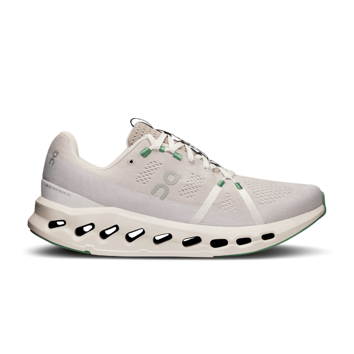 "On Running Cloudsurfer Pearl Ivory sneakers by Hype Elixir – trail-ready shoes with CloudTec® cushioning, featuring a sleek Pearl Ivory colorway for comfort and performance on rugged paths."