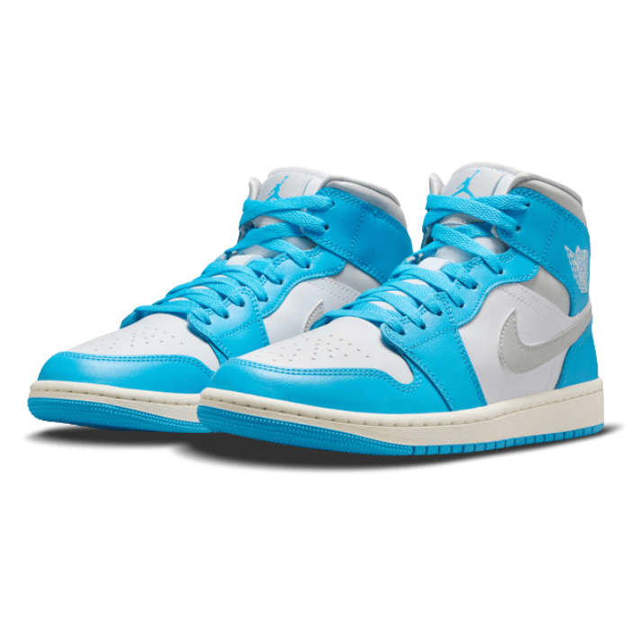 Women's Air Jordan 1 Mid in Dark Powder Blue blends heritage design with modern flair for everyday wear. Shop on HypeElixir.com.