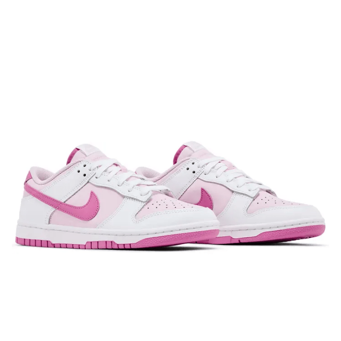 Step up your sneaker game with Nike Dunk Low Pink Foam (Women's), combining soft pink tones and a sleek design. Shop now at HypeElixir.com.