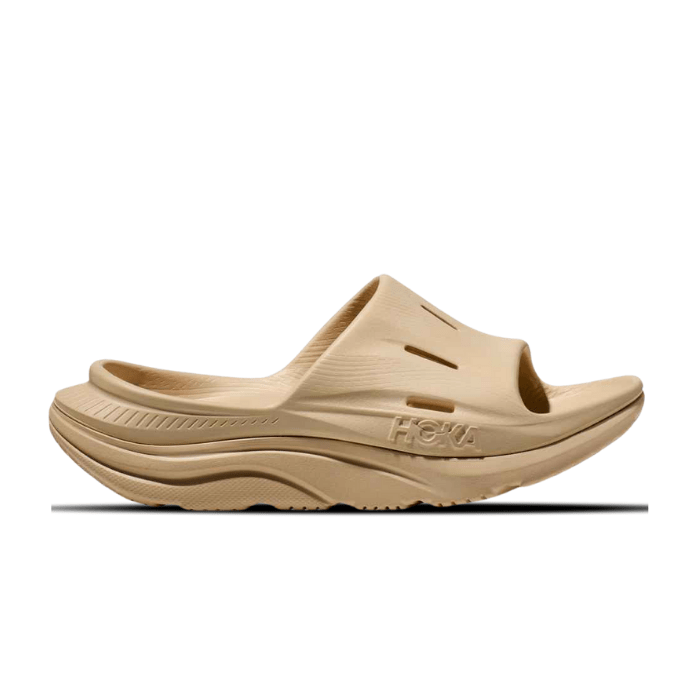 Hoka ORA Recovery Slide 3 Shifting Sand – ultra-comfy recovery slides with cushioned support. Shop on hypeelixir.com