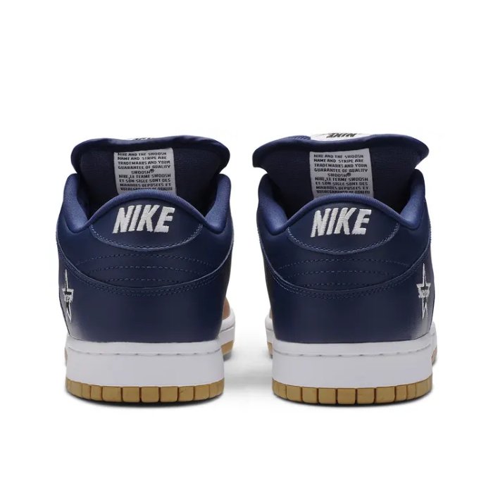 Gold jewel swoosh accents the Nike SB Dunk Low Supreme, offering a fresh and luxurious twist to the iconic silhouette Find yours at HypeElixir.com