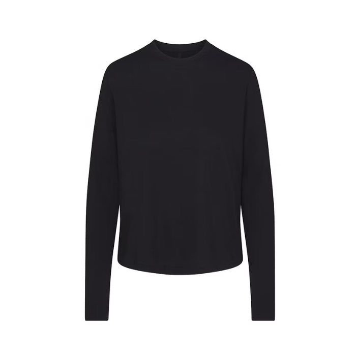 Skims Relaxed Long Sleeve Tee in Onyx—ultra-soft, lightweight, and perfect for everyday layering or lounging. Shop on HypeElixir.com.