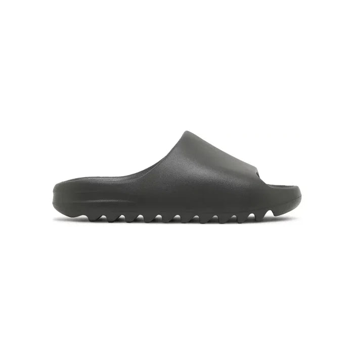 "Yeezy Slide Dark Onyx by Hype Elixir – minimalist, lightweight slide with a sleek dark onyx finish for ultimate comfort and streetwear style."