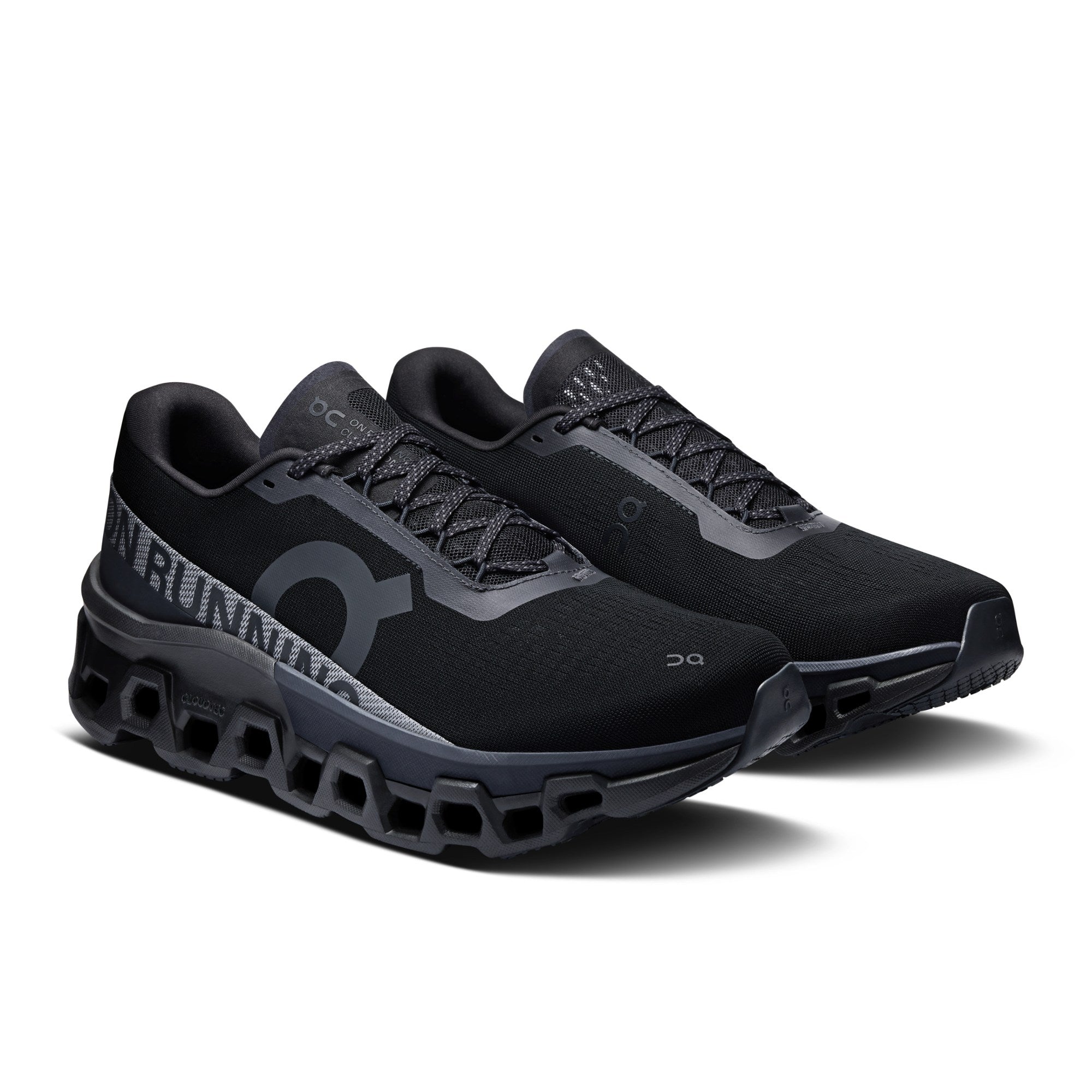 "On Running Cloudmonster 2 Black sneakers by Hype Elixir – high-performance running shoes designed for maximum cushioning, energy return, and a sleek all-black aesthetic."