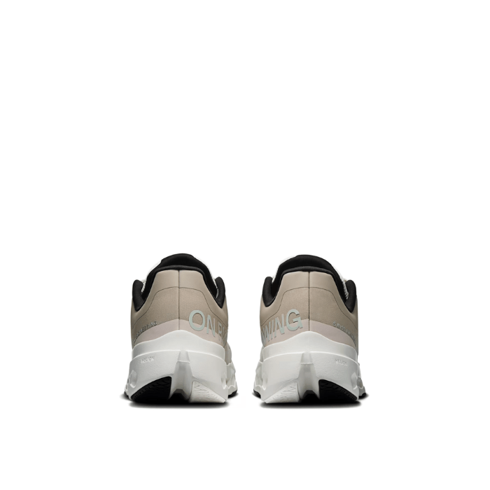 On Running Cloudsurfer Next Fog Ivory offers lightweight cushioning and stability for all-day comfort. Shop now on hypeelixir.com