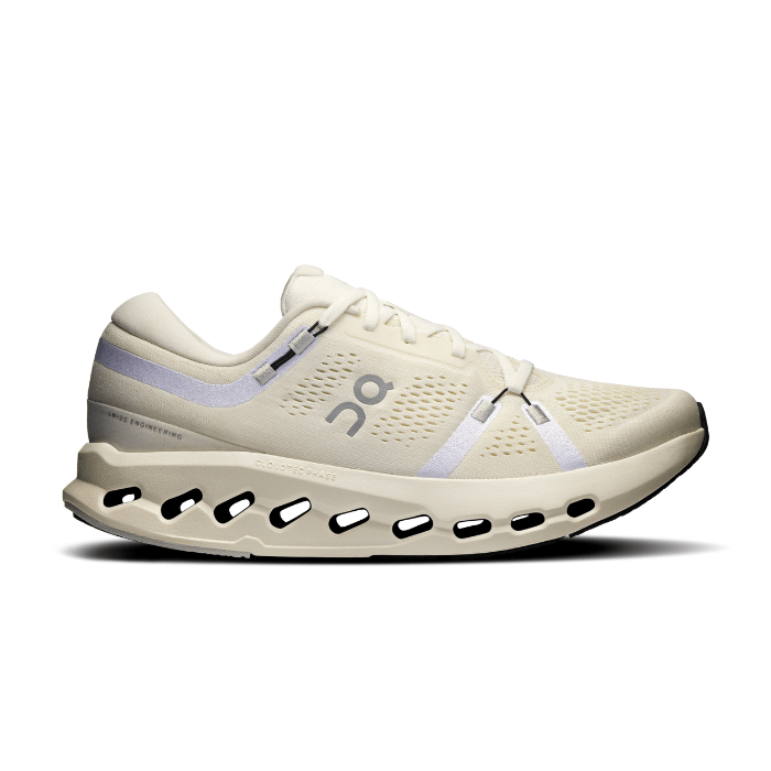 "On Running Cloudsurfer 2 Ivory sneakers by Hype Elixir – lightweight, cushioned running shoes with a sleek ivory colorway for optimal comfort and performance."