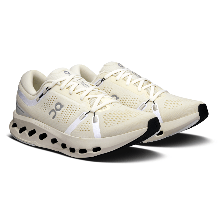 "On Running Cloudsurfer 2 Ivory sneakers by Hype Elixir – lightweight, cushioned running shoes with a sleek ivory colorway for optimal comfort and performance."