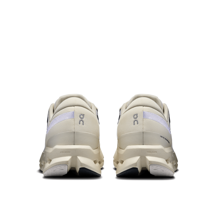 "On Running Cloudsurfer 2 Ivory sneakers by Hype Elixir – lightweight, cushioned running shoes with a sleek ivory colorway for optimal comfort and performance."