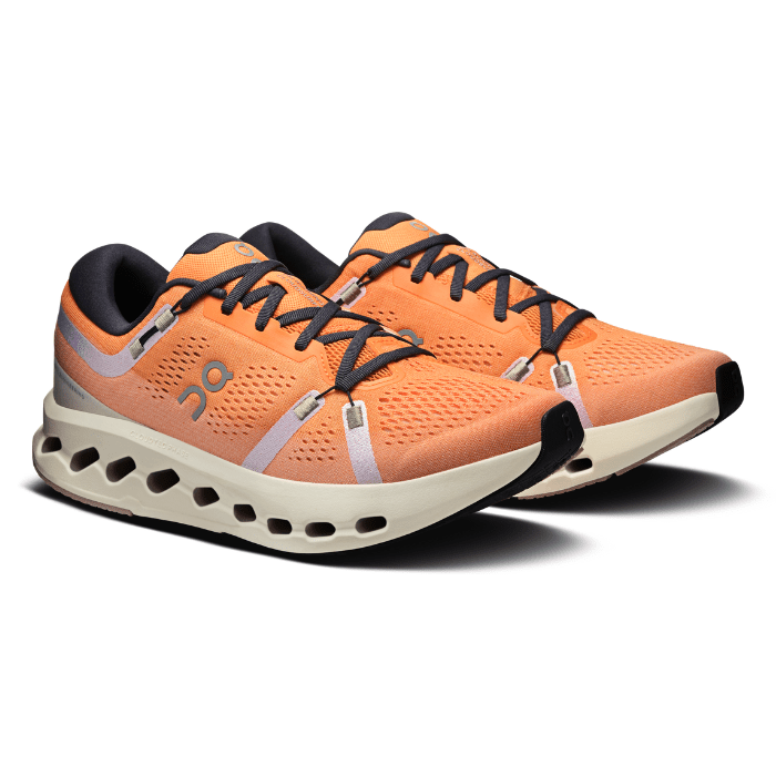 "On Running Cloudsurfer 2 Tangerine Ivory sneakers by Hype Elixir – lightweight, cushioned running shoes with a vibrant tangerine and ivory colorway for comfort and style."