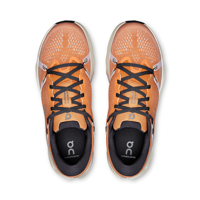 "On Running Cloudsurfer 2 Tangerine Ivory sneakers by Hype Elixir – lightweight, cushioned running shoes with a vibrant tangerine and ivory colorway for comfort and style."