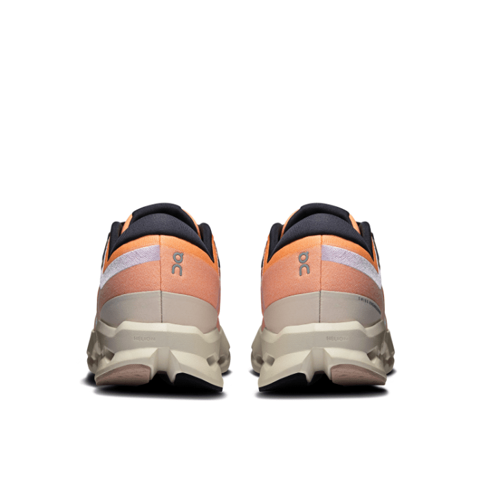 "On Running Cloudsurfer 2 Tangerine Ivory sneakers by Hype Elixir – lightweight, cushioned running shoes with a vibrant tangerine and ivory colorway for comfort and style."