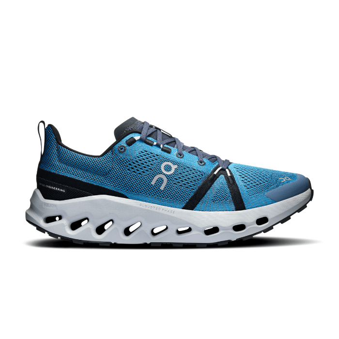 "On Running Cloudsurfer Nigeria Glacier sneakers by Hype Elixir – lightweight, cushioned, and durable footwear designed for trail running and outdoor adventures."