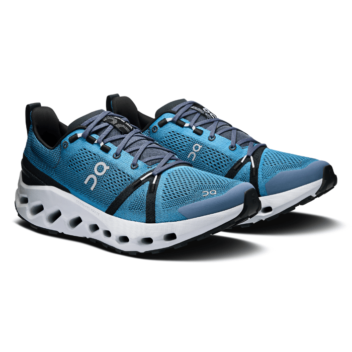 "On Running Cloudsurfer Nigeria Glacier sneakers by Hype Elixir – lightweight, cushioned, and durable footwear designed for trail running and outdoor adventures."