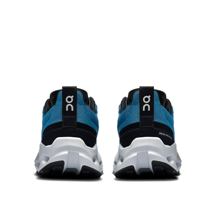 "On Running Cloudsurfer Nigeria Glacier sneakers by Hype Elixir – lightweight, cushioned, and durable footwear designed for trail running and outdoor adventures."