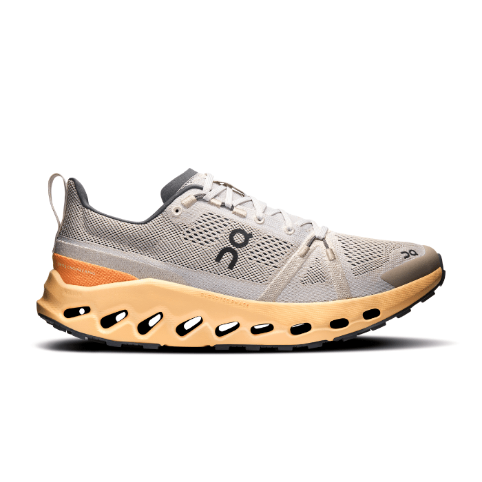 "On Running Cloudsurfer Trail Silver Blonde sneakers by Hype Elixir – lightweight, cushioned, and durable trail shoes for all-terrain comfort and performance."