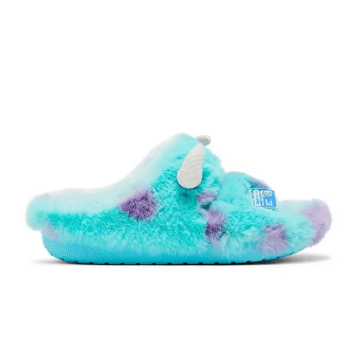 "Crocs Classic Cozzzy Sandal Monsters Inc. Sulley – cozy sandals featuring Sulley from Monsters Inc., with soft, plush lining and fun, colorful design for ultimate comfort and style."