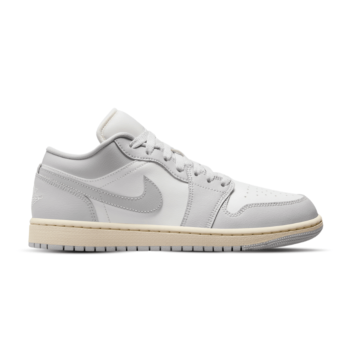 Women's Jordan 1 Low in Coconut Milk and Neutral Grey – a soft, stylish classic for daily wear. Shop on HypeElixir.com.
