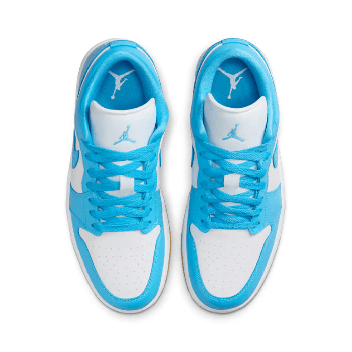 Jordan 1 Low (Women's) features white leather, gum outsole, and powder blue details for everyday flair. Shop on HypeElixir.com