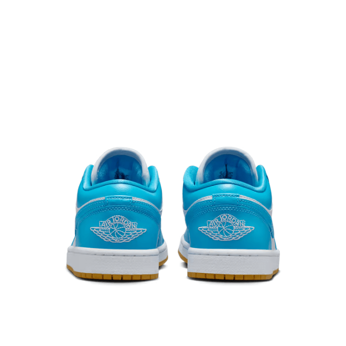 Women's Jordan 1 Low in White Gum with Light Brown and Dark Powder Blue accents – stylish and timeless. Shop on HypeElixir.com