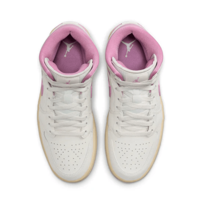 Elevate your sneaker game with Jordan 1 Mid Sail Pink Coconut Milk (Women's) – soft, stylish, and versatile. Shop on HypeElixir.com.