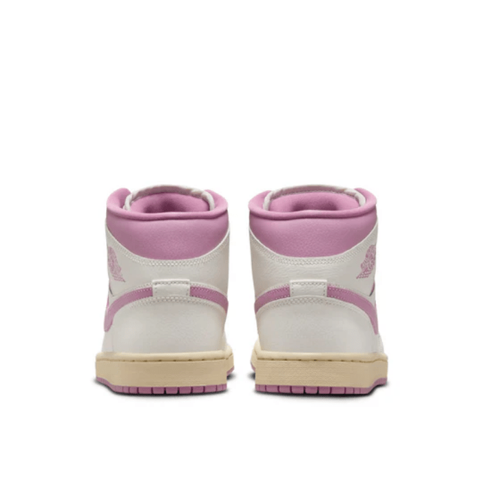 Elevate your sneaker game with Jordan 1 Mid Sail Pink Coconut Milk (Women's) – soft, stylish, and versatile. Shop on HypeElixir.com.