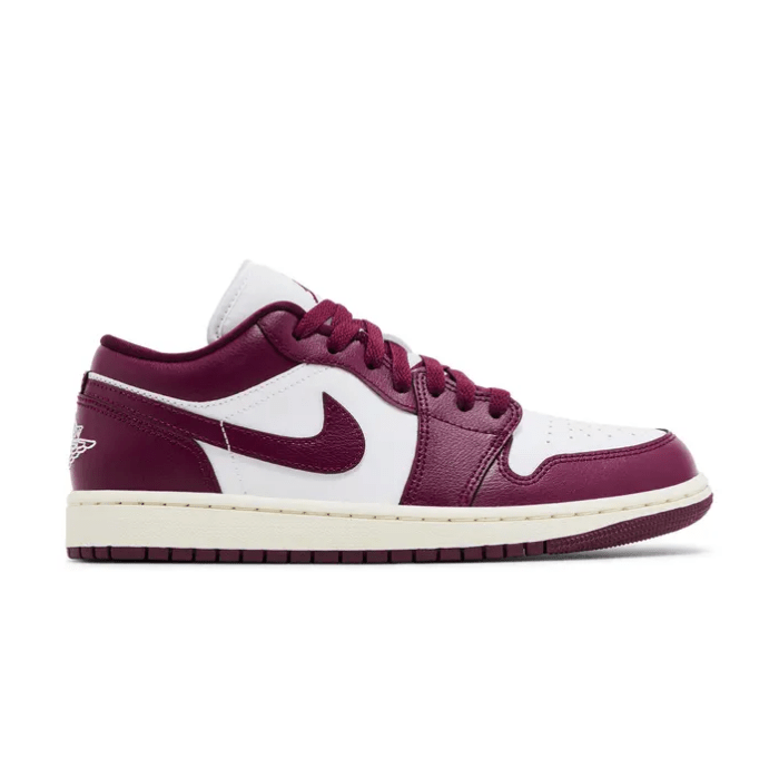Jordan 1 Low Bordeaux (Women's) features rich burgundy tones with classic detailing and a clean finish. Shop on HypeElixir.com.