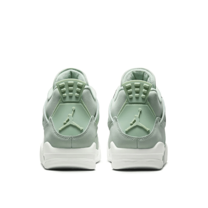 Women's Jordan 4 Retro Seafoam Sail features soft green accents and classic style for everyday wear. Shop on HypeElixir.com.