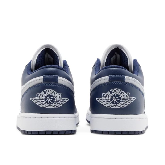Jordan 1 Low in Wolf Grey and Midnight Navy offers timeless style with premium comfort and a cool vibe. Shop on HypeElixir.com.