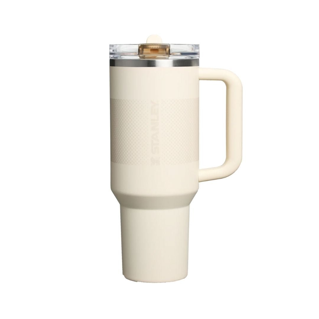 Stanley Quencher ProTour 40oz tumbler in Cream Fade with flip straw, durable & insulated for all-day hydration. Shop on HypeElixir.com