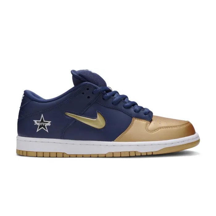 Nike SB Dunk Low Supreme Jewel Swoosh Gold – iconic design with a gold jewel swoosh for a premium touch. A must-have for sneakerheads Shop now at HypeElixir.com.