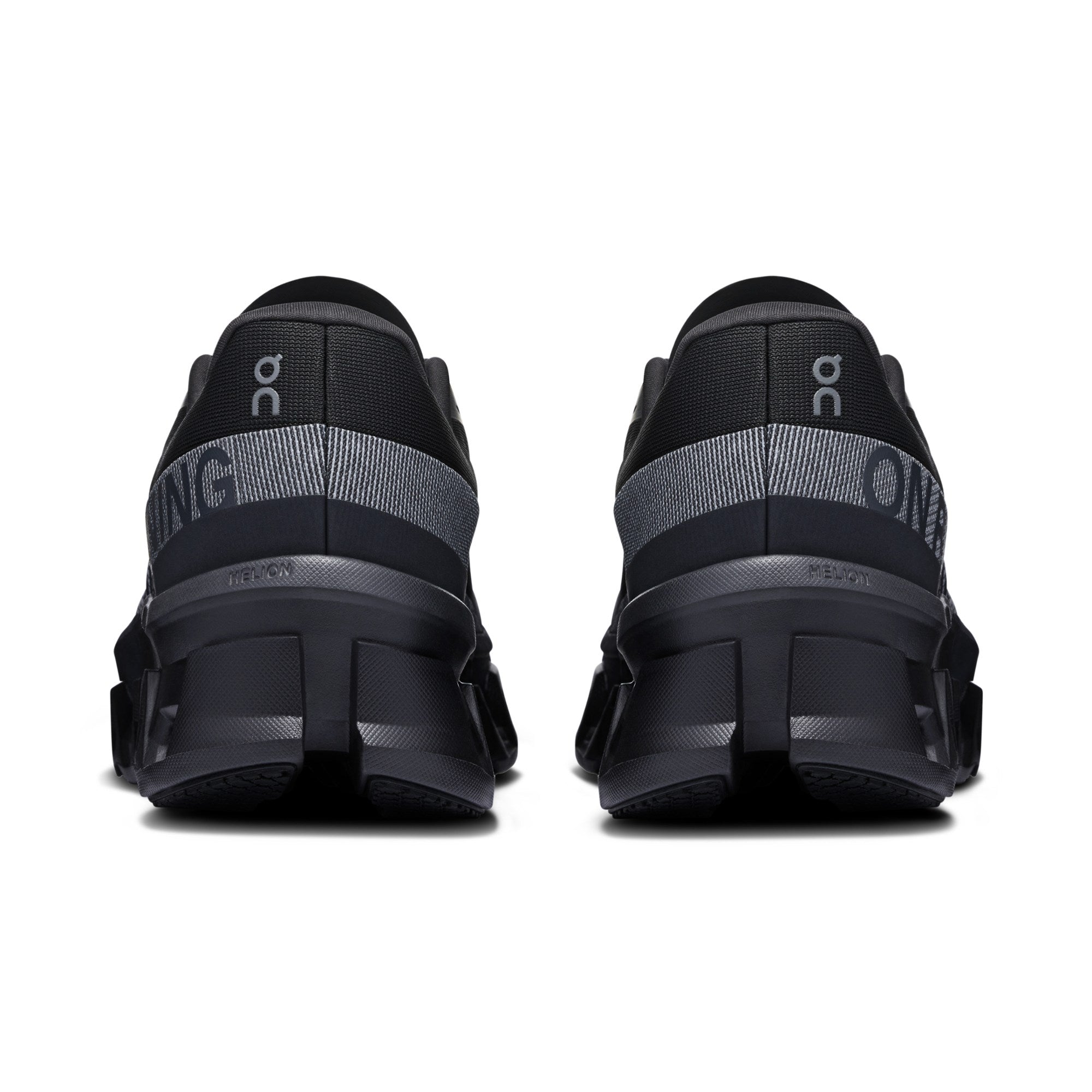 "On Running Cloudmonster 2 Black sneakers by Hype Elixir – high-performance running shoes designed for maximum cushioning, energy return, and a sleek all-black aesthetic."